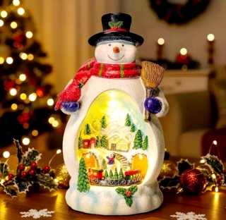 Сувенир музыкальный 24 см. YL-2 ( Снеговик с жел. дорогой)